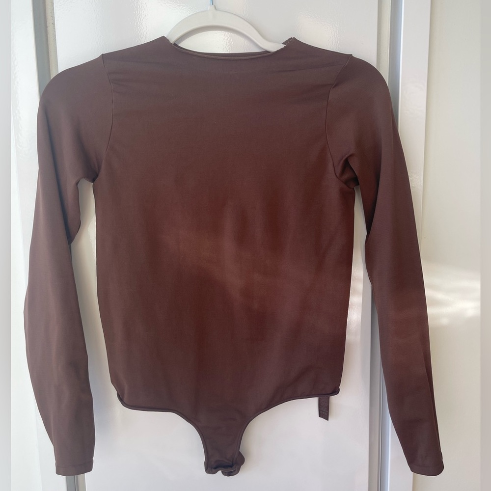 Skims Essential crew neck long sleeve bodysuit